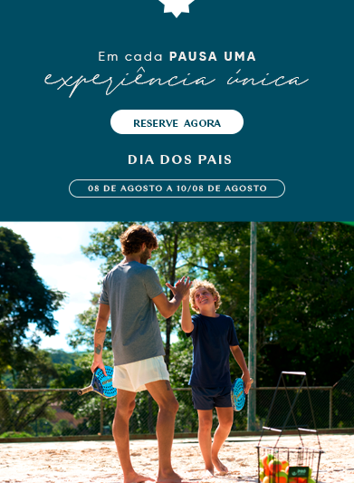 pai e filho na quadra de tênis do Grande Hotel